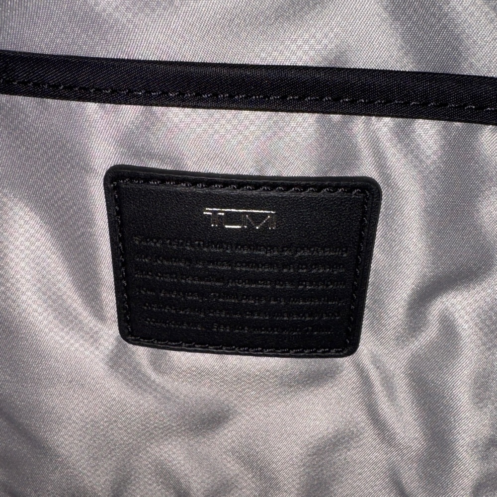 NWOT RARE TUMI Monett Black Camo mini sling backpack - Picture 7 of 9